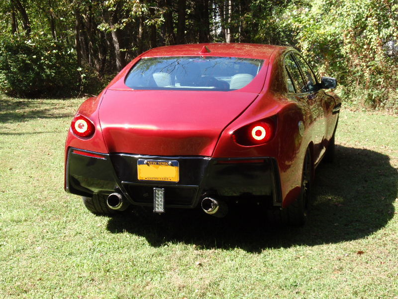 Illustration for article titled I Am Oddly OK With This Aston Martin Malibu Zagato
